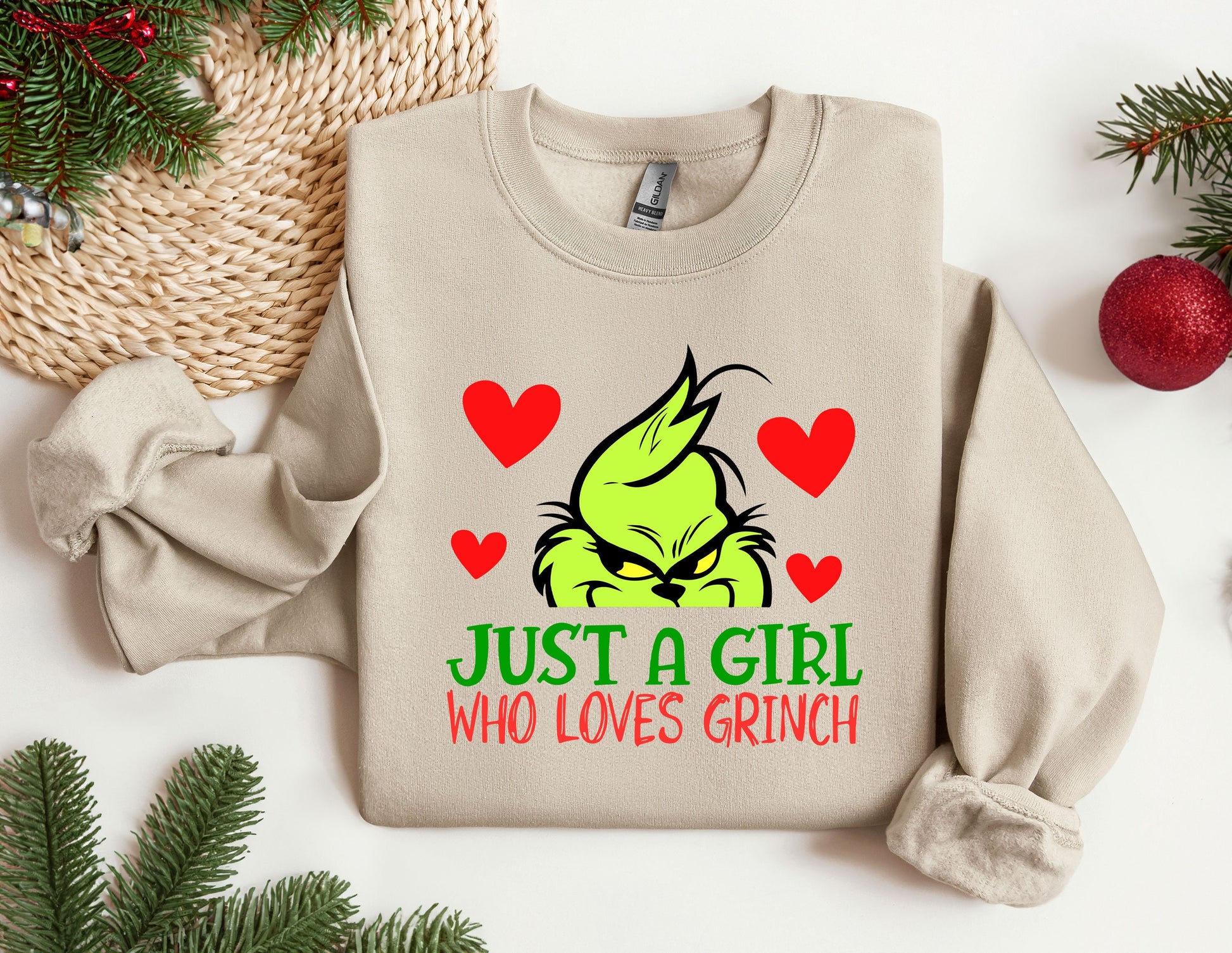 a sweater that says just a girl who loves grin