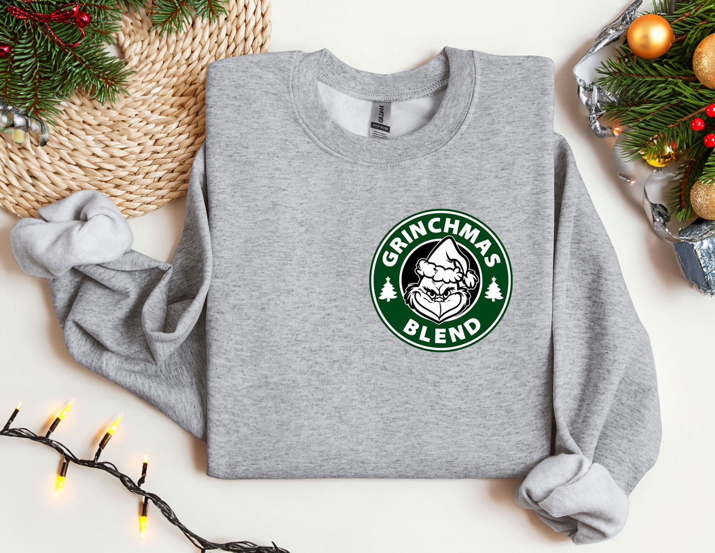 a gray sweatshirt with a starbucks logo on it