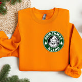 an orange sweatshirt with a starbucks logo on it
