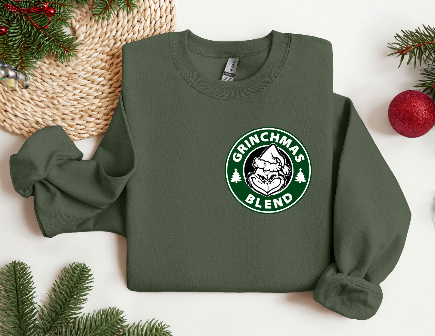 a green sweatshirt with a starbucks logo on it