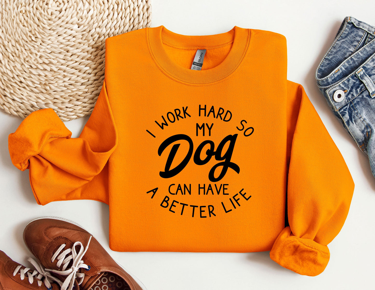 a sweatshirt that says work hard so my dog can have a better life