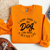 a sweatshirt that says work hard so my dog can have a better life