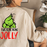 a woman sitting in a chair wearing a sweatshirt that says, this is me being