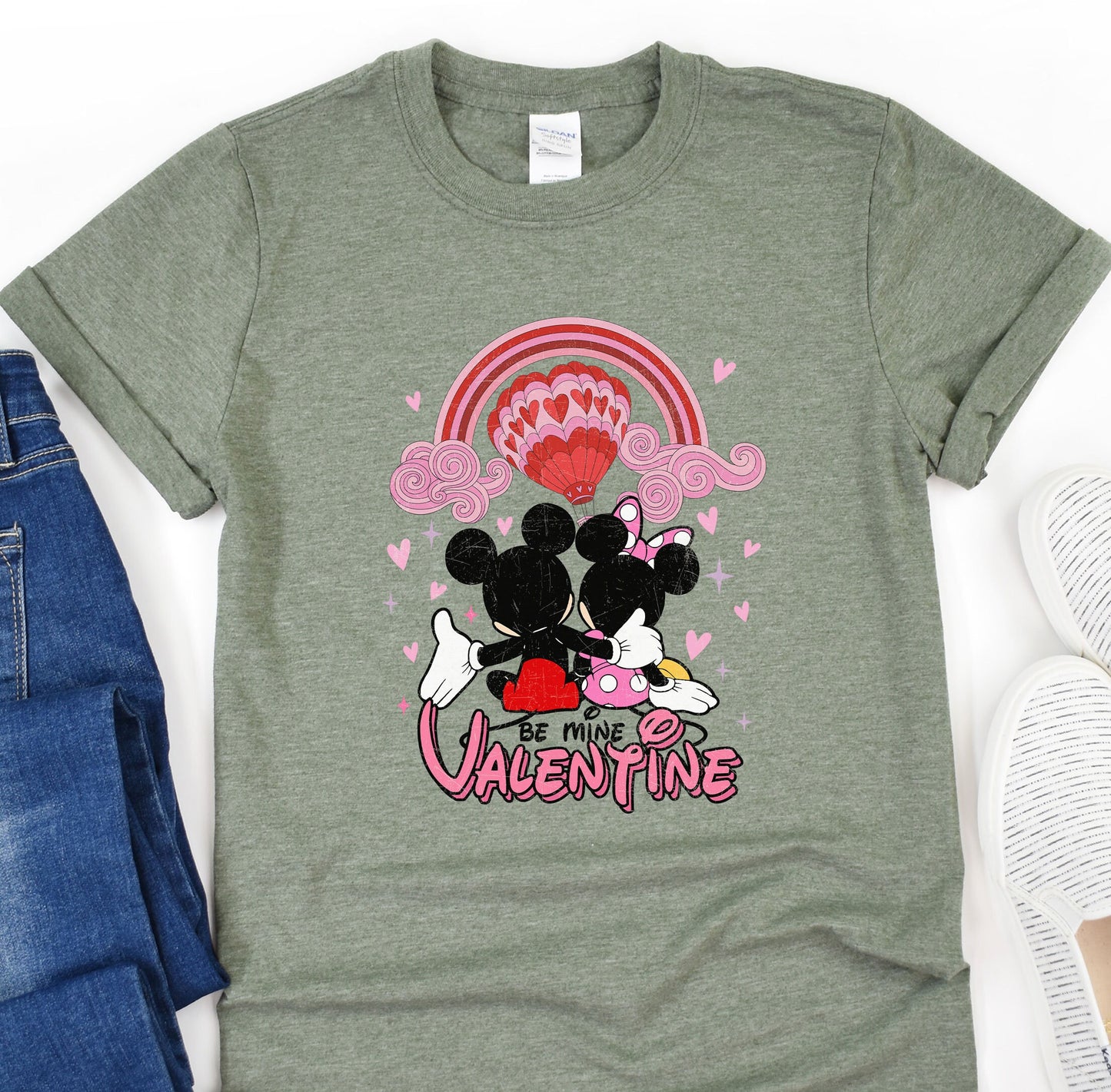 a couple of mickey and minnie mouse shirts