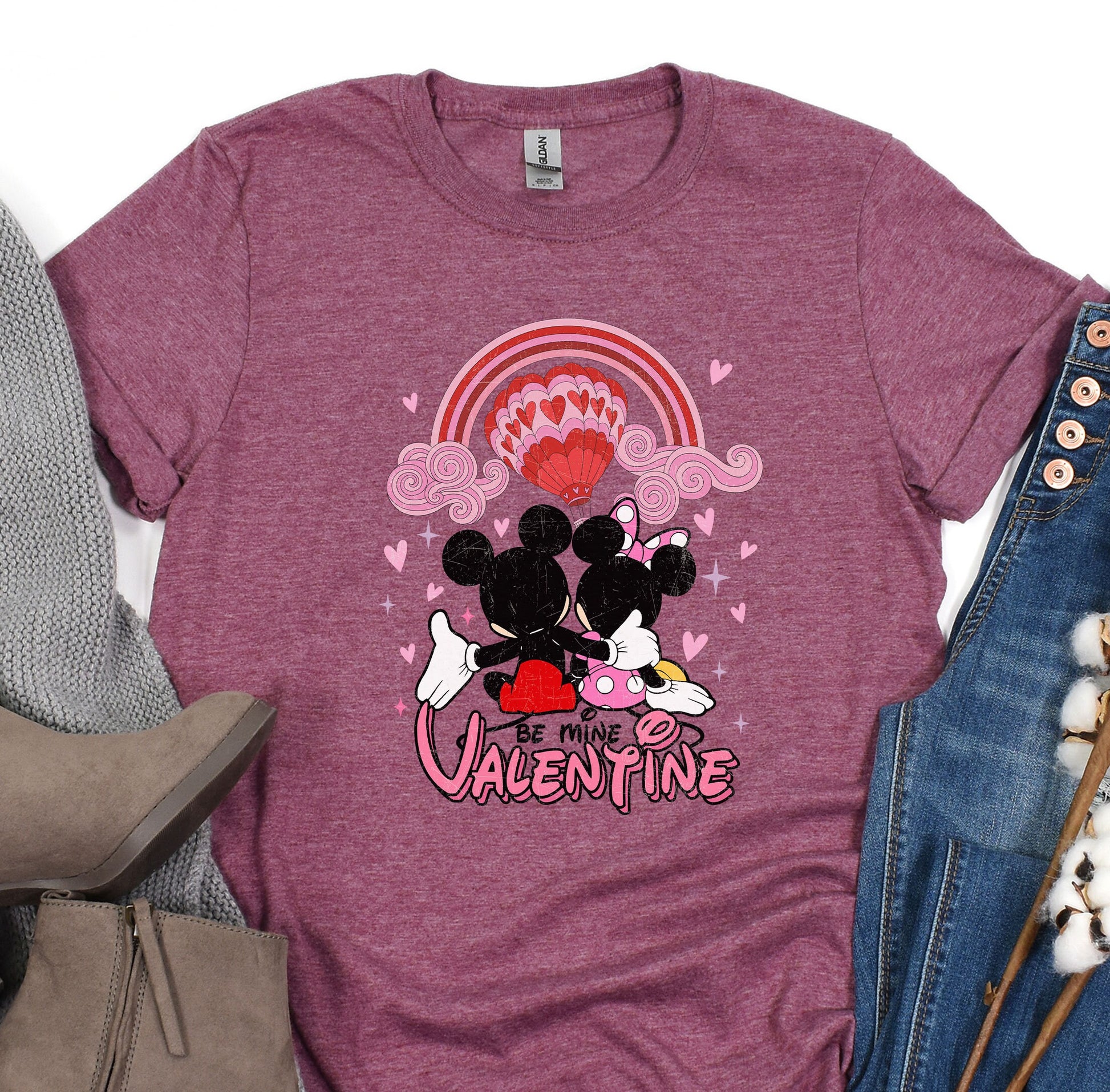 a t - shirt with a mickey and minnie mouse on it