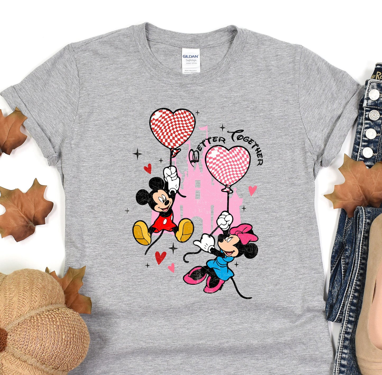 a t - shirt with a mickey mouse and minnie mouse on it