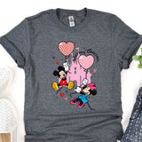 a t - shirt with a mickey mouse and minnie mouse on it
