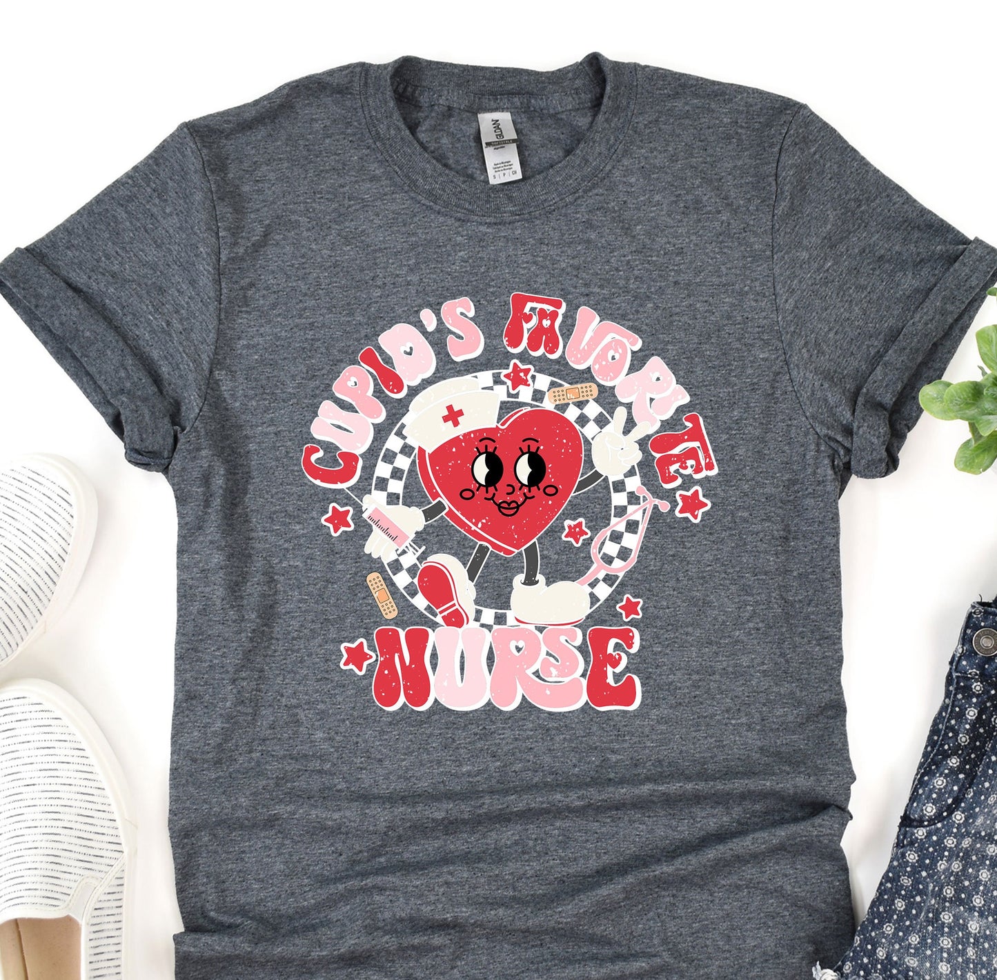 a t - shirt with a nurse heart on it