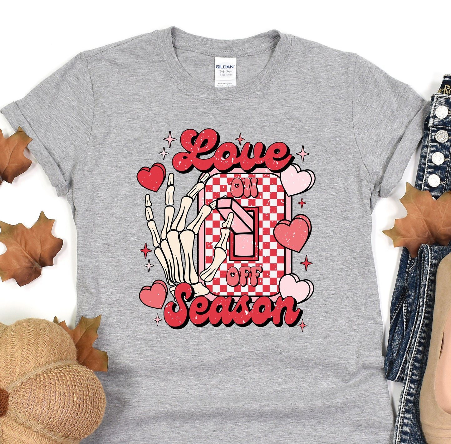 a t - shirt that says love is in the air