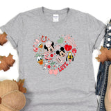 a t - shirt with mickey and minnie mouses on it