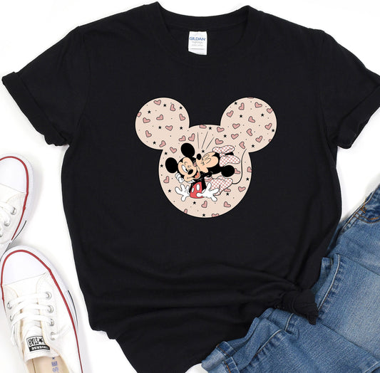 a mickey mouse shirt with hearts on it