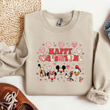 a pair of sneakers and a sweater with mickey mouse on it