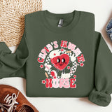 a green sweatshirt with a heart on it