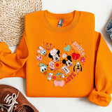 a pair of shoes and a mickey mouse shirt