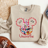 a sweater with a mickey mouse design on it