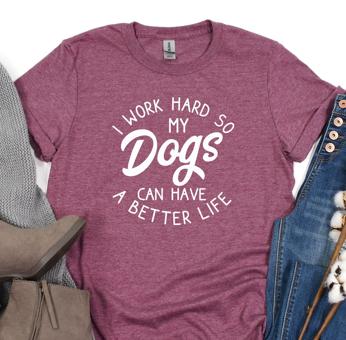 a t - shirt that says i work hard so my dogs can have a better