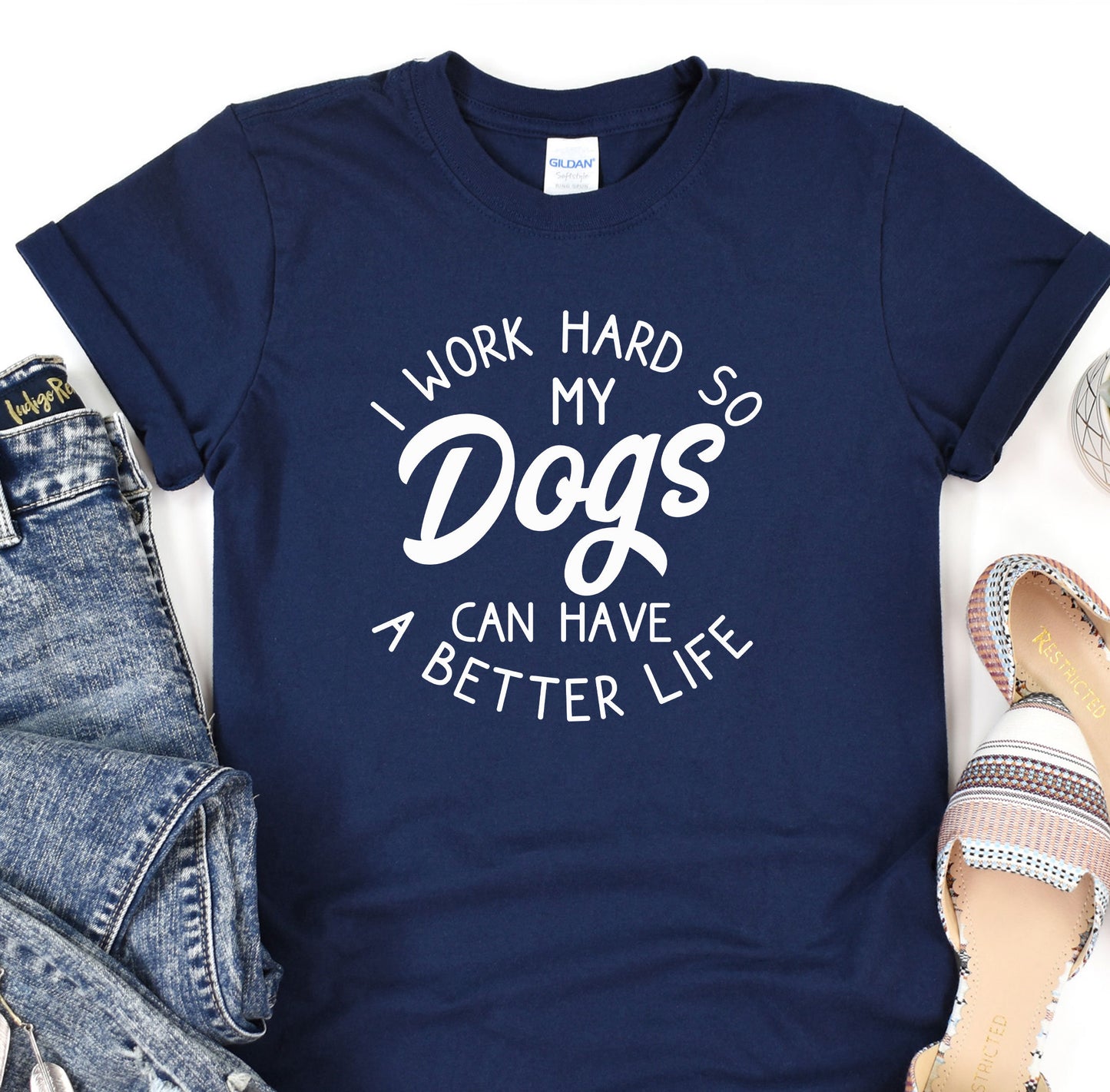 a t - shirt that says i work hard so my dogs can have a better