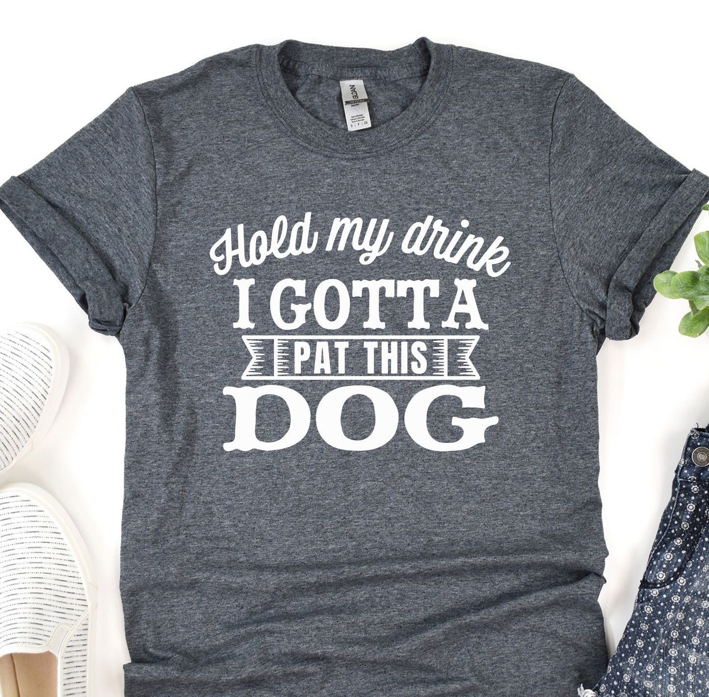 a t - shirt that says i got a pat this dog