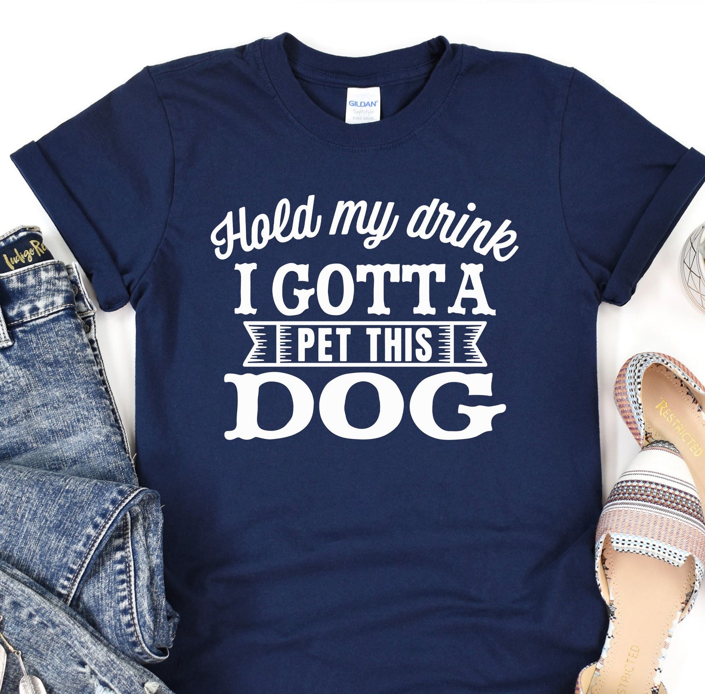 a t - shirt that says i gota pet this dog