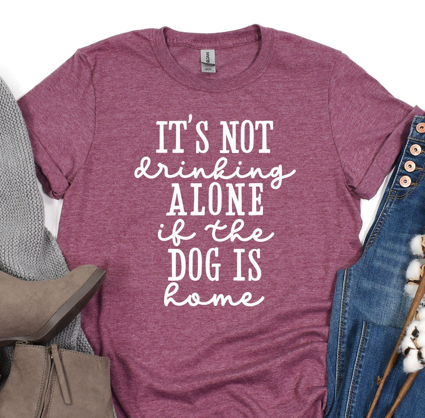 a t - shirt that says it&#39;s not drinking alone if the dog is