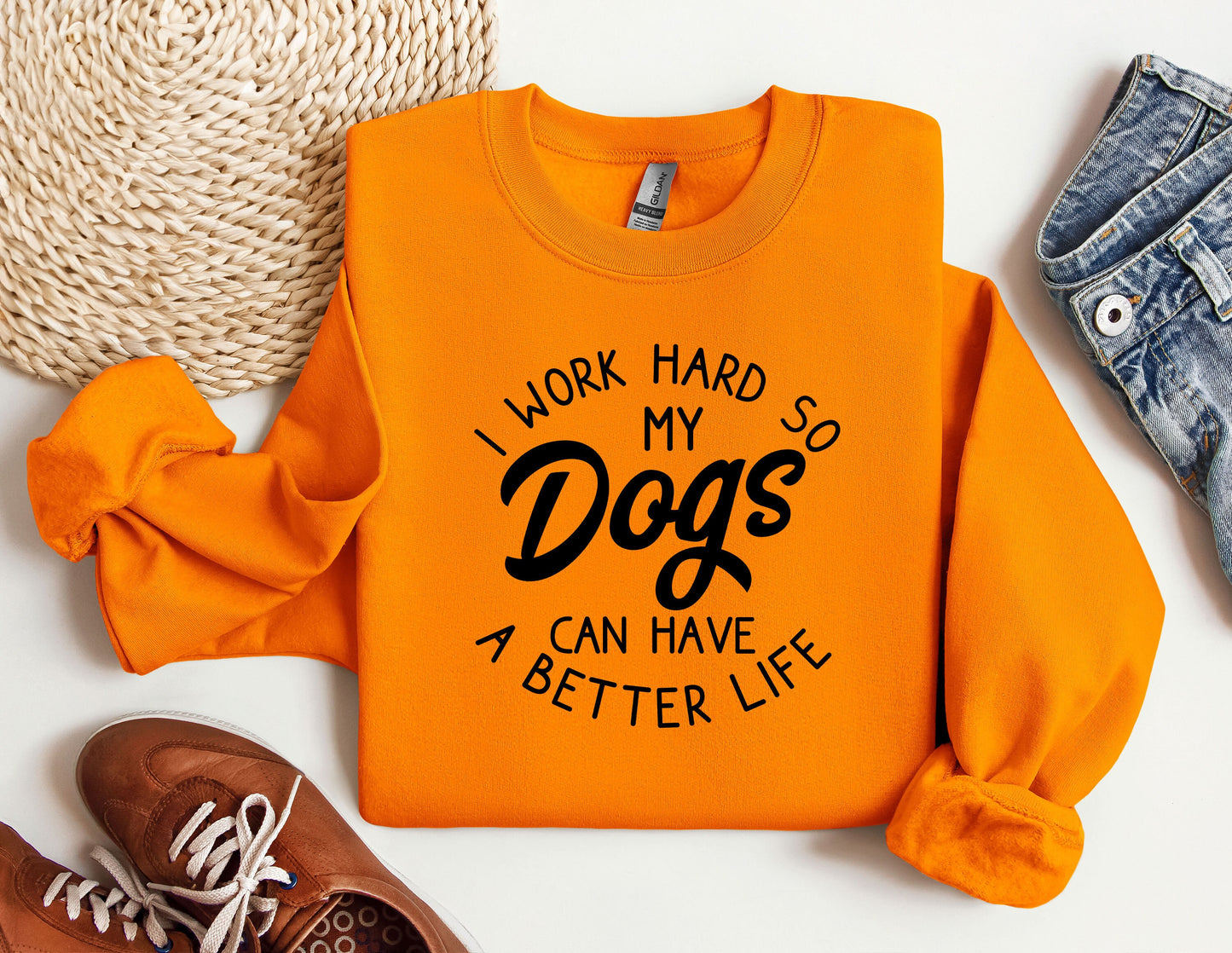 a sweatshirt that says i work hard so my dogs can have a better life