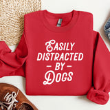 a red sweatshirt that says easily distracted by dogs