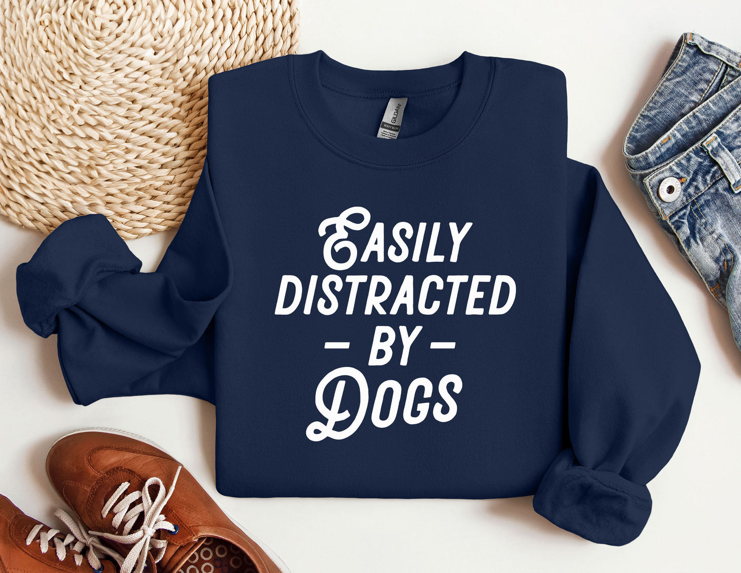 a sweatshirt that says easily distracted by dogs