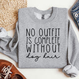 a sweatshirt that says, no outfit is complete without a hair
