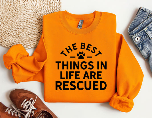 an orange sweatshirt with the words the best things in life are recorded