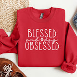 a red shirt that says, blessing and dog obsesed