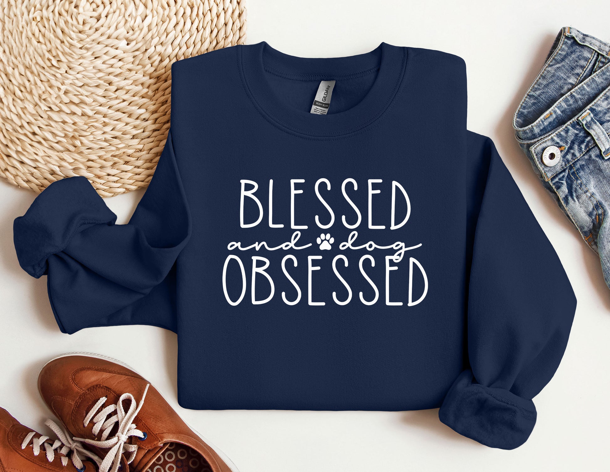 a blue sweatshirt that says, blessing and dog obsesed