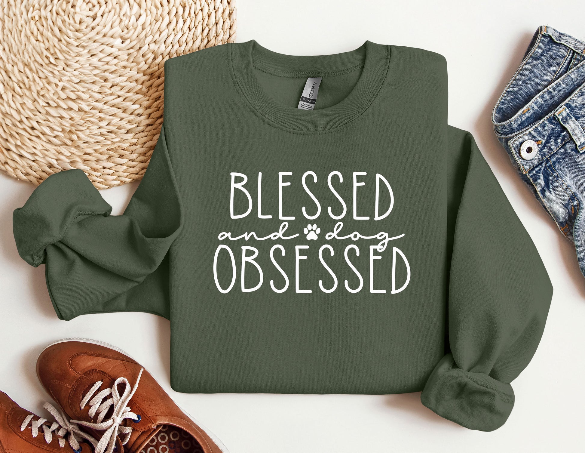 a green sweatshirt that says, blessing and dog obsesed