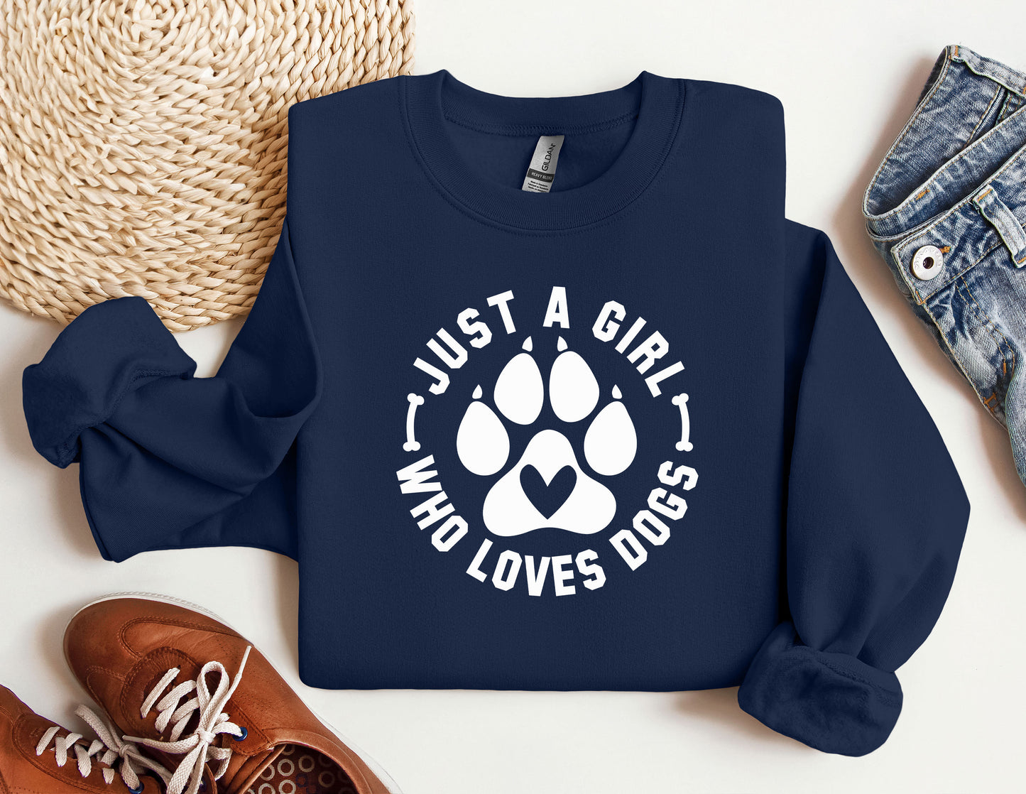 a blue sweatshirt with a dog paw on it