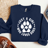 a blue sweatshirt with a dog paw on it