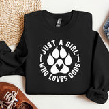 a black sweatshirt with a white dog paw on it