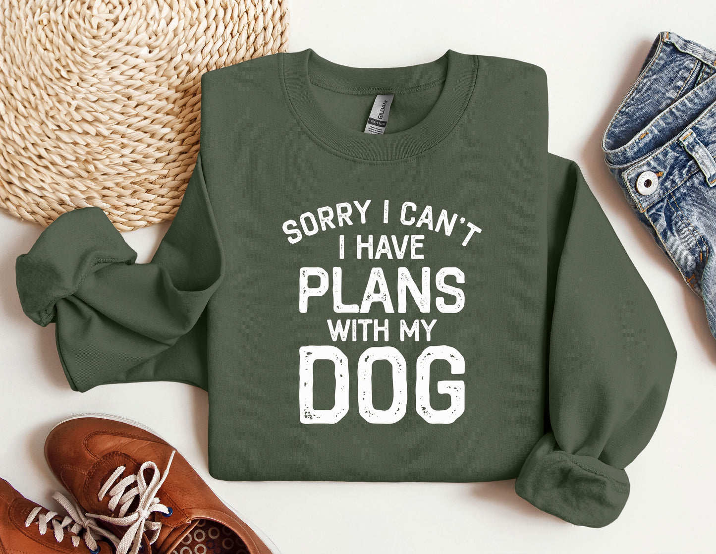 a green sweatshirt that says sorry i can&#39;t i have plans with my dog