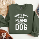 a green sweatshirt that says sorry i can't i have plans with my dog