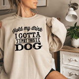 a woman wearing a sweatshirt that says, i gota eat this dog