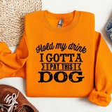an orange sweatshirt that says i got a pat this dog