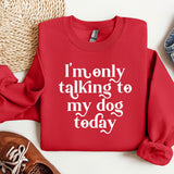 a red sweatshirt with a dog saying on it