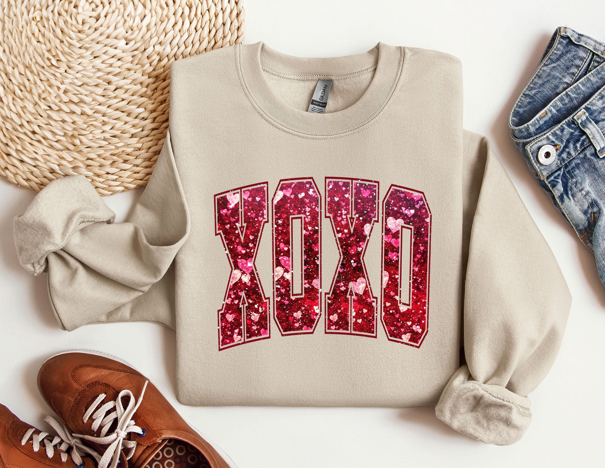 a pair of shoes and a sweatshirt with the word dad on it