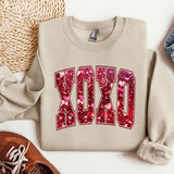 a pair of shoes and a sweatshirt with the word dad on it