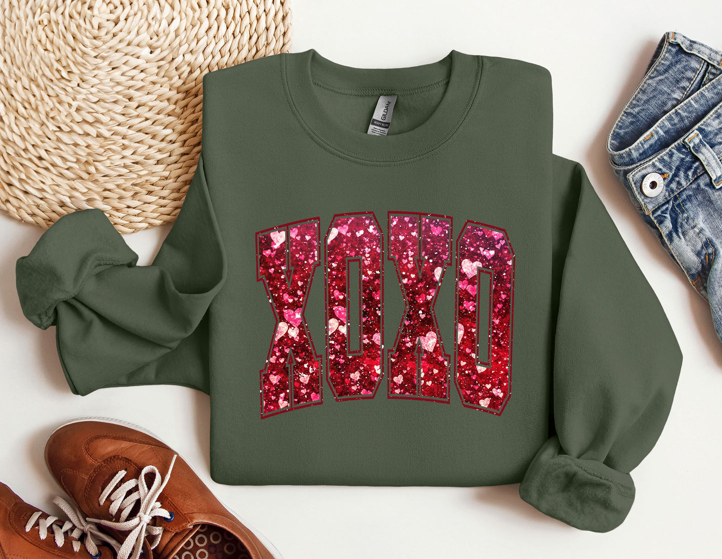 a green sweatshirt with the word dad printed on it