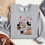 a couple of mickey and minnie mouse shirts