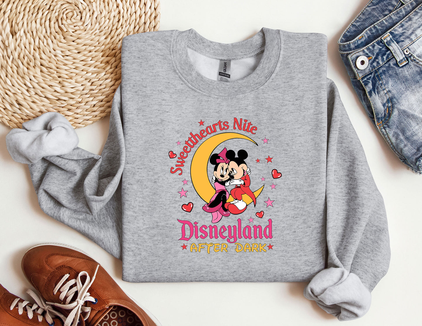 a sweatshirt with a mickey mouse on it