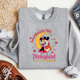 a sweatshirt with a mickey mouse on it