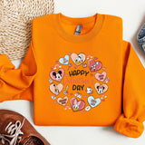 a pair of shoes and a sweater with a cartoon character on it