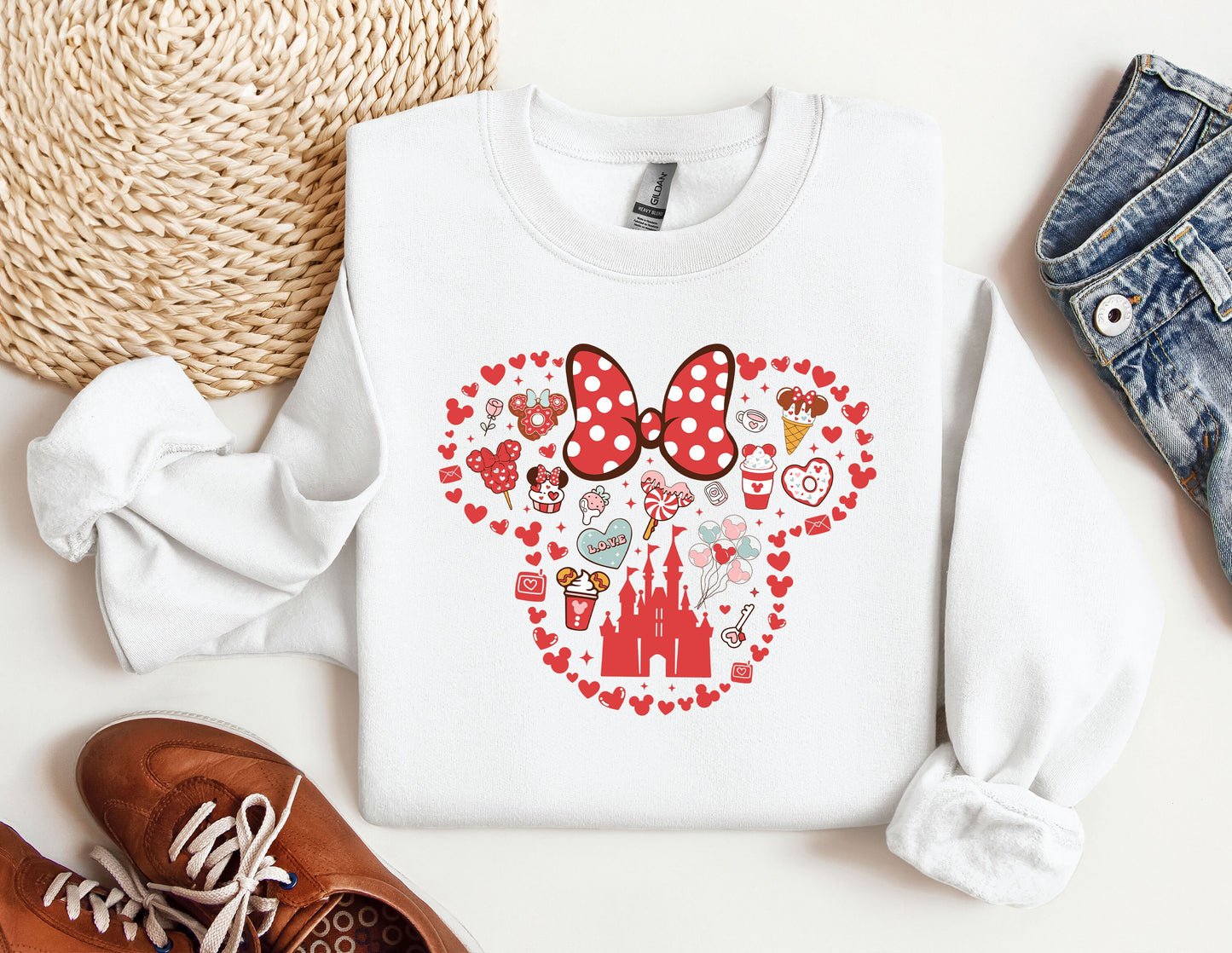 a white shirt with a minnie mouse design on it