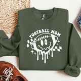 a green sweatshirt with a football mom on it