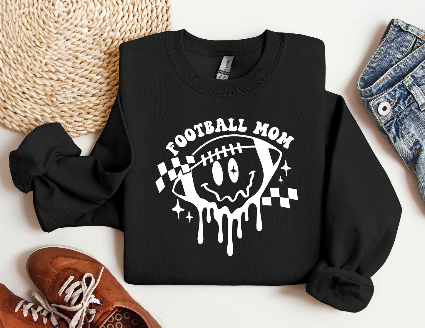 a black sweatshirt with a football mom on it